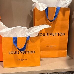 Louis Vuitton Vibrant Orange Bag with Blue Handles